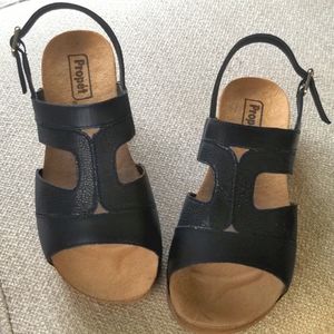Black leather open-toe sandals 9 xx, new in box.